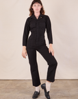 Alex is 5'8" and wearing XXS Long Sleeve Jumpsuit in Basic Black