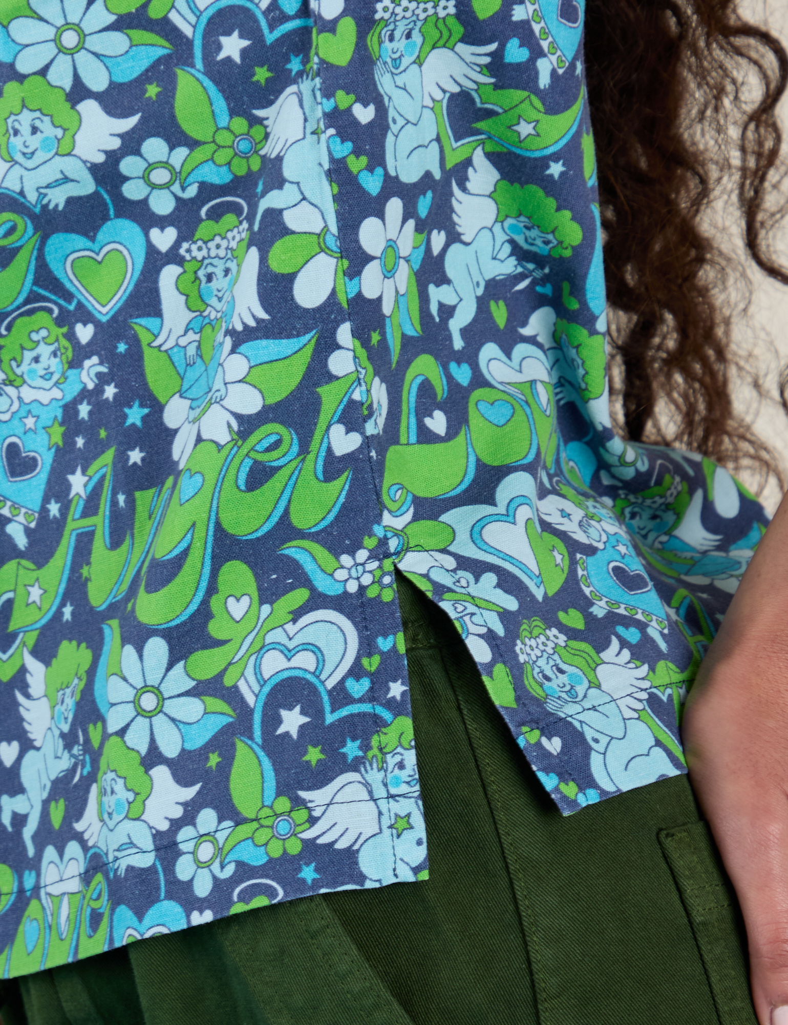 Close up of Angel Print Pantry Button-Up side vent