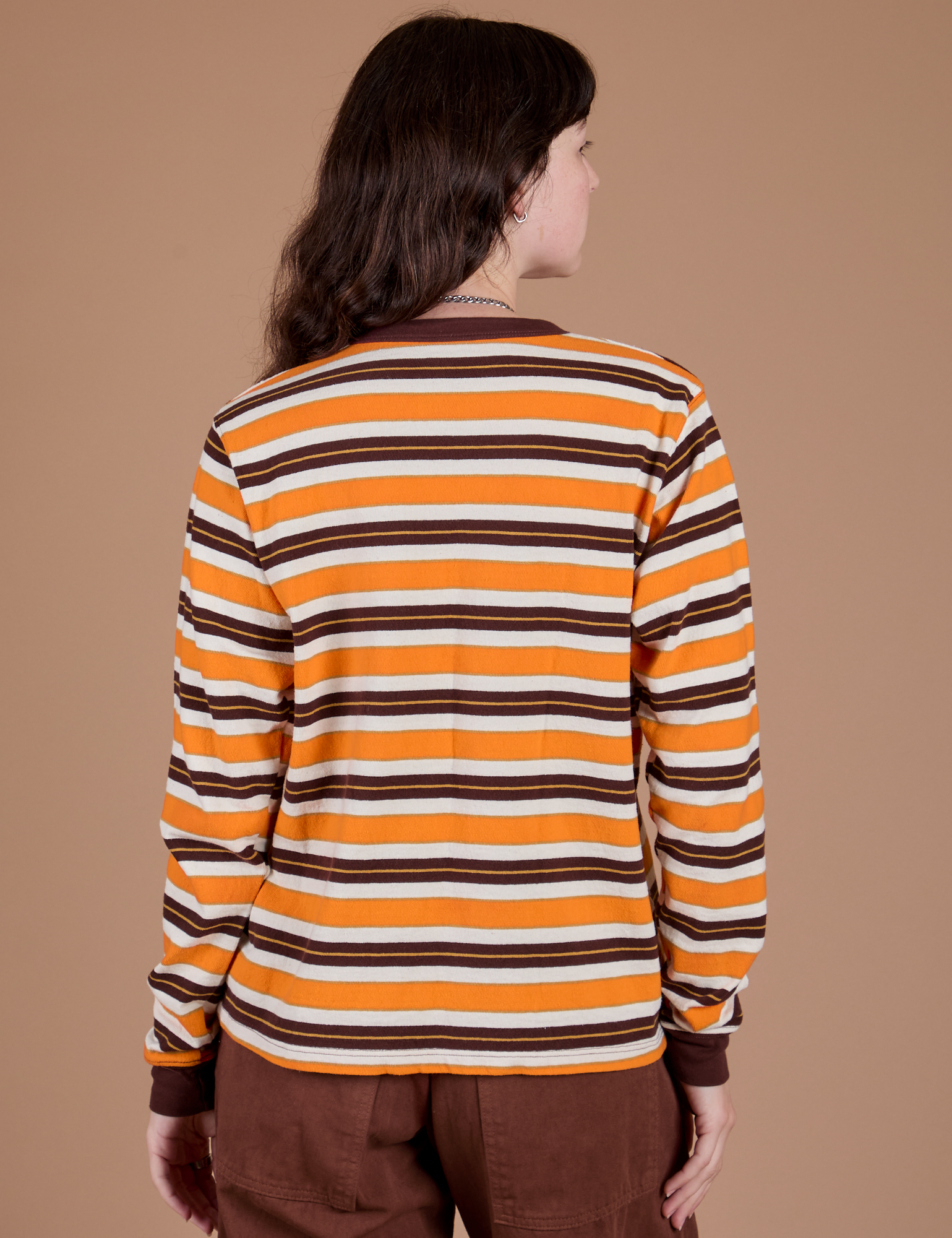 Back view of Long Sleeve Striped Burly Tee in Orange on Alex