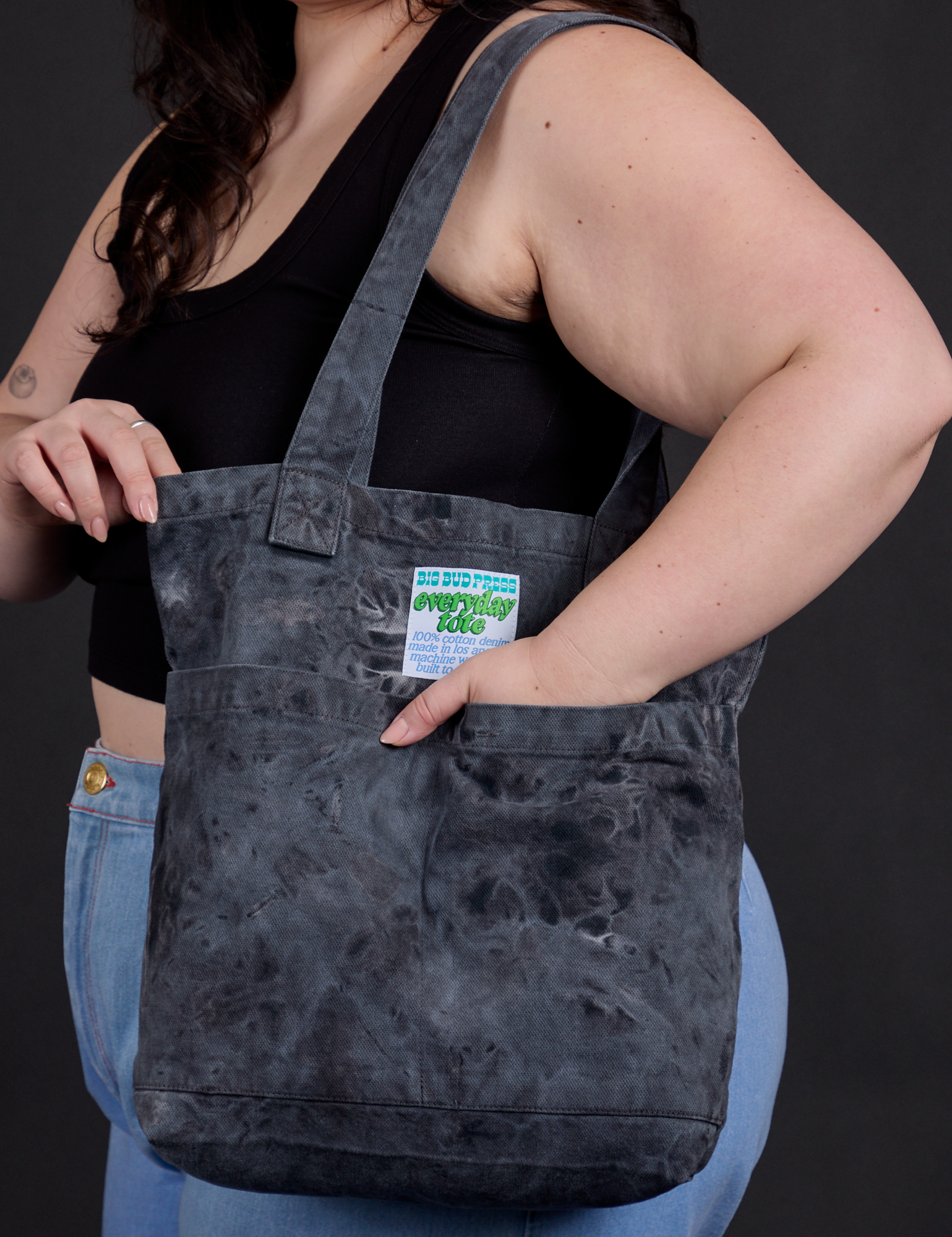Everyday Tote in Black Magic Waters worn over shoulder of model