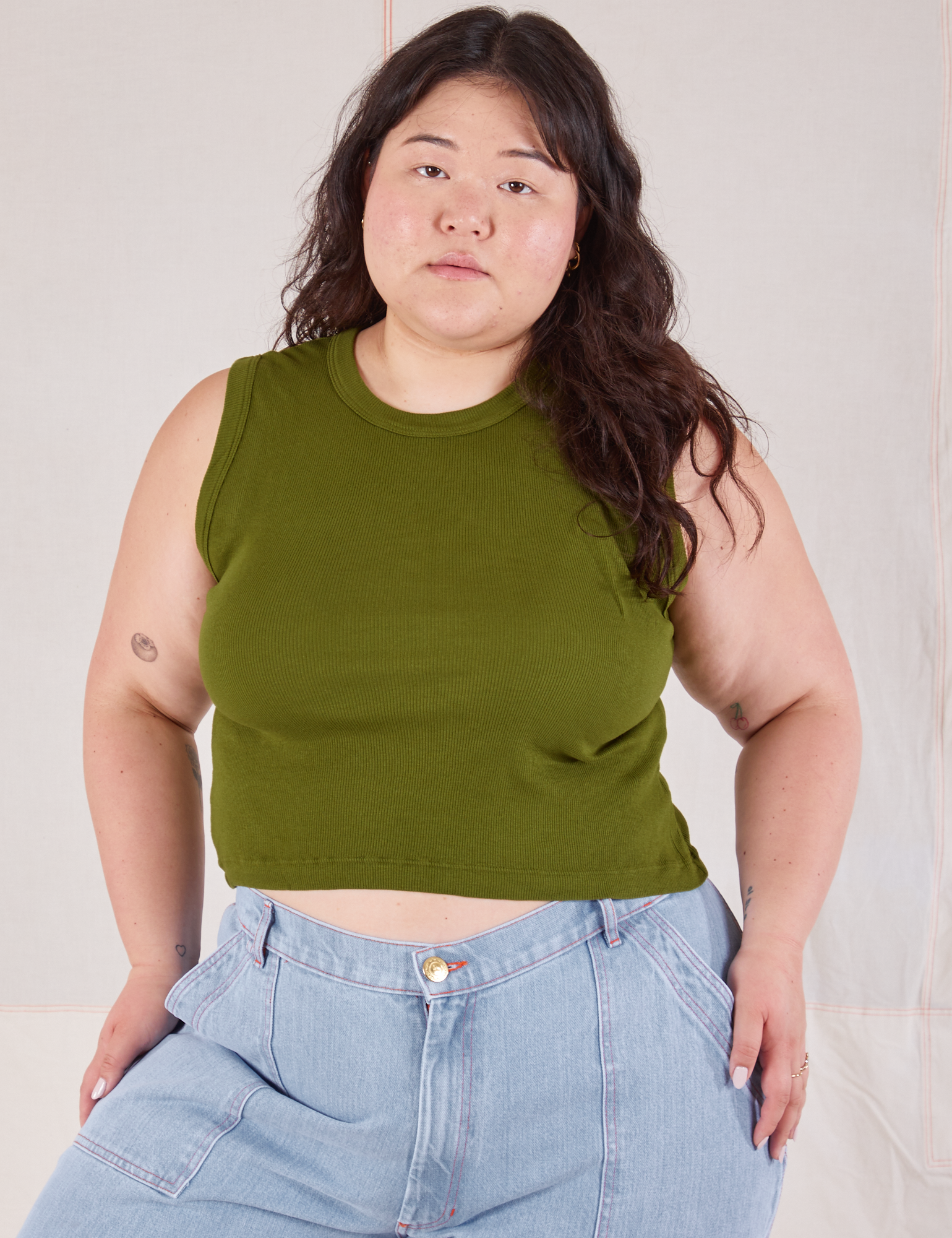 Ashley is 5’7” and wearing XL Muscle Tee in Summer Olive