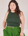 Ashley is 5’7” and wearing XL Racerback Tank in Swamp Green