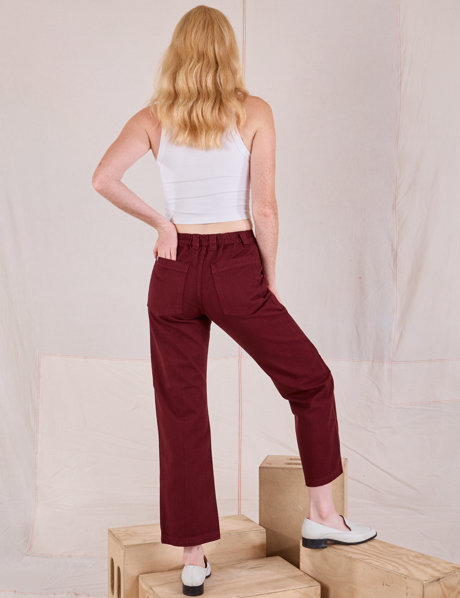 Mid-Rise Work Pants in Red Wine back view on Margaret