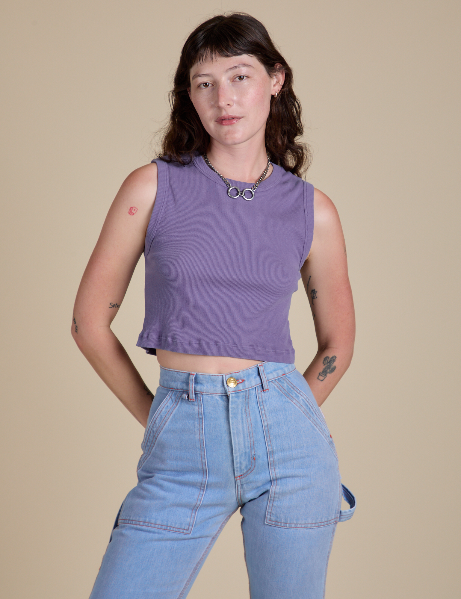 Alex is 5’8” and wearing XP Muscle Tee in Faded Grape