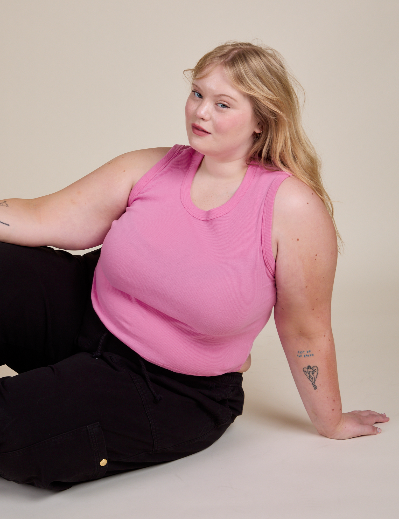 Juliet is wearing Muscle Tee in Bubblegum Pink