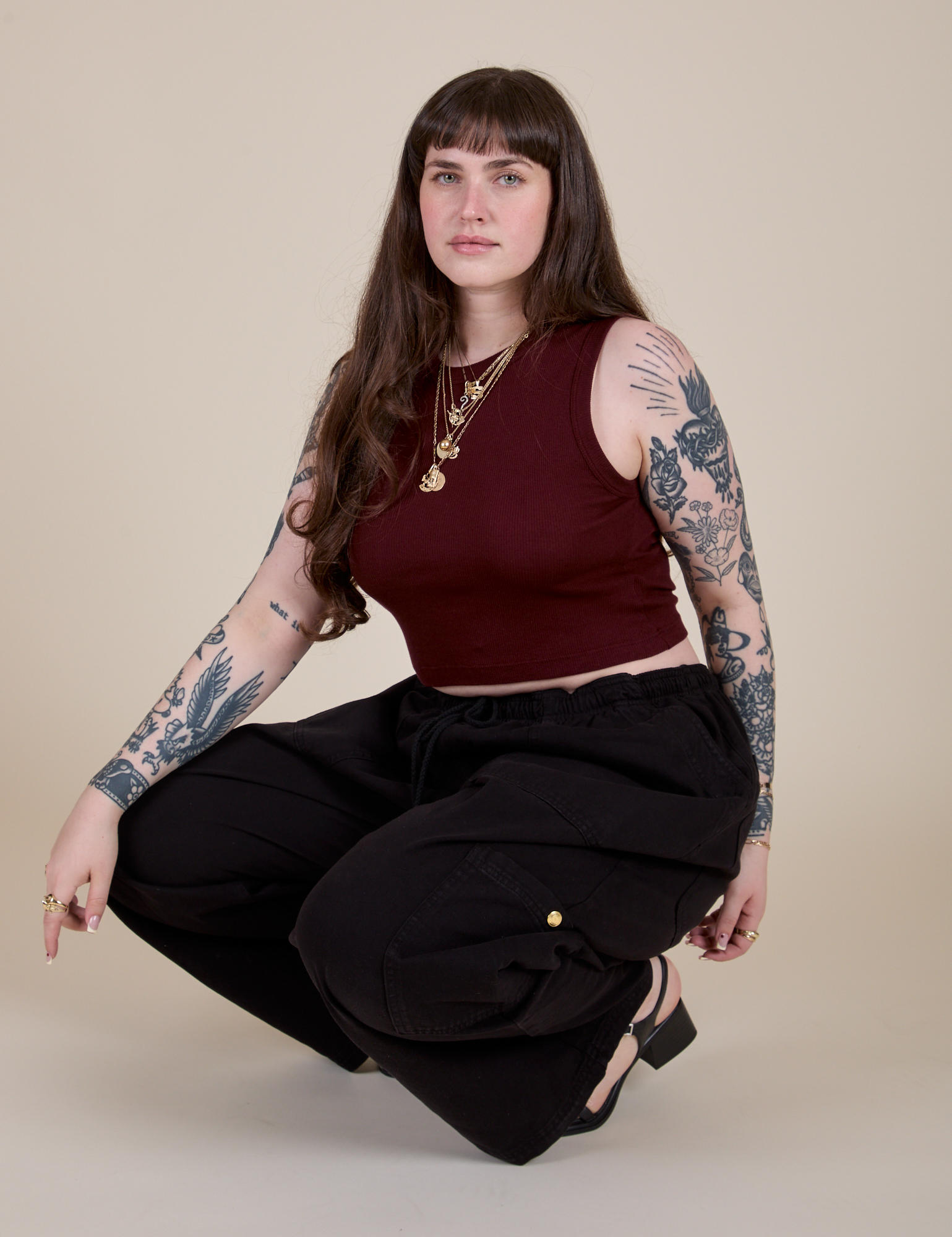 Muscle Tee in Red Wine and black Drop Pocket Cargo Pants on Sydney