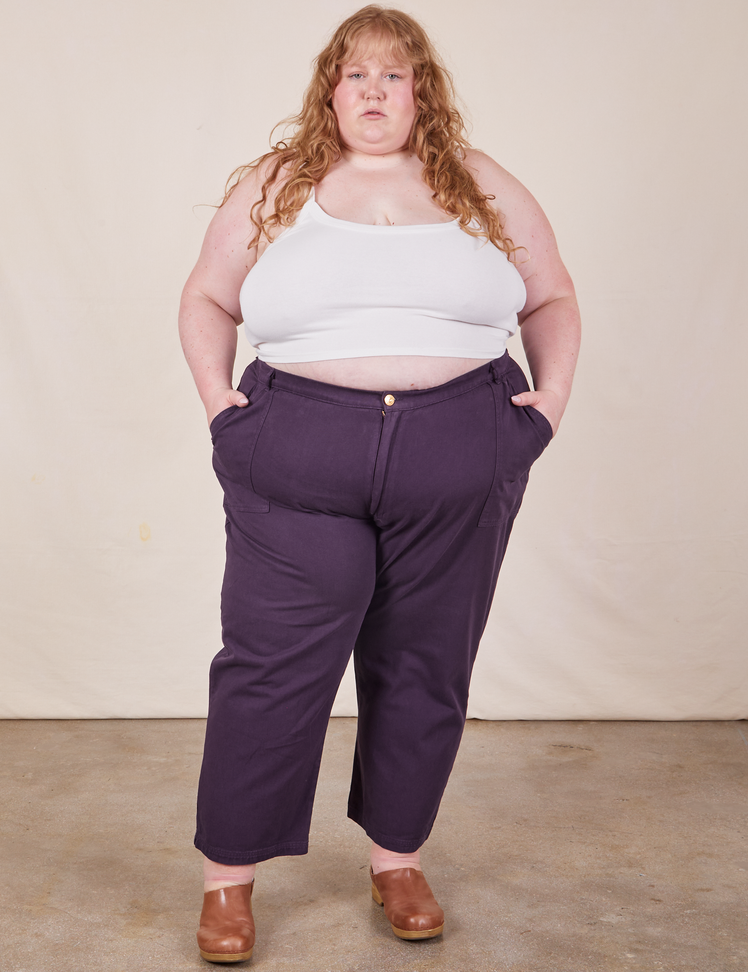 Catie is 5&#39;11&quot; and wearing 5XL Work Pants in Nebula Purple and vintage off-white Cami