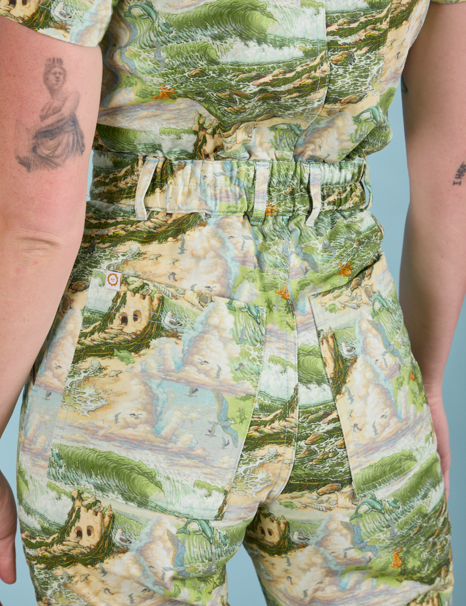 Ocean and Sky Jumpsuit back close up on Alex