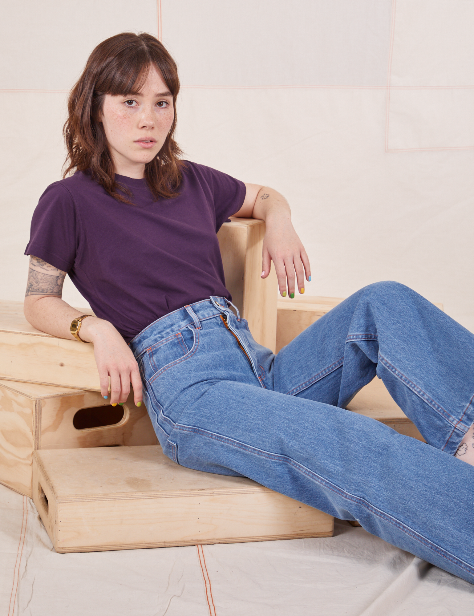 Hana is wearing The Organic Vintage Tee in Nebula Purple and Sailor Jeans