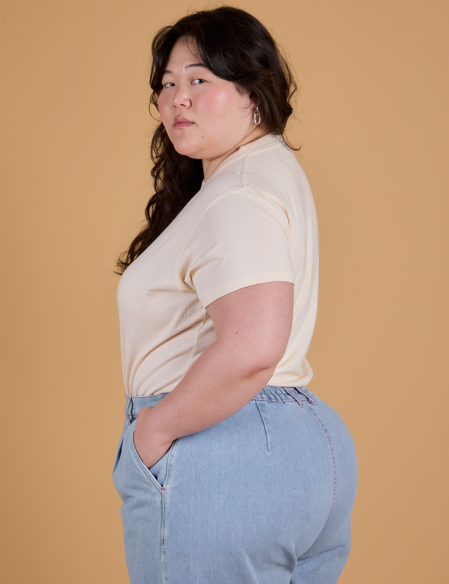 Side view of Organic Vintage Tee in Vintage Off White on Ashley