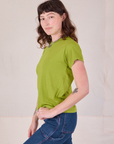 Side view of Organic Vintage Tee in Gross Green on Alex