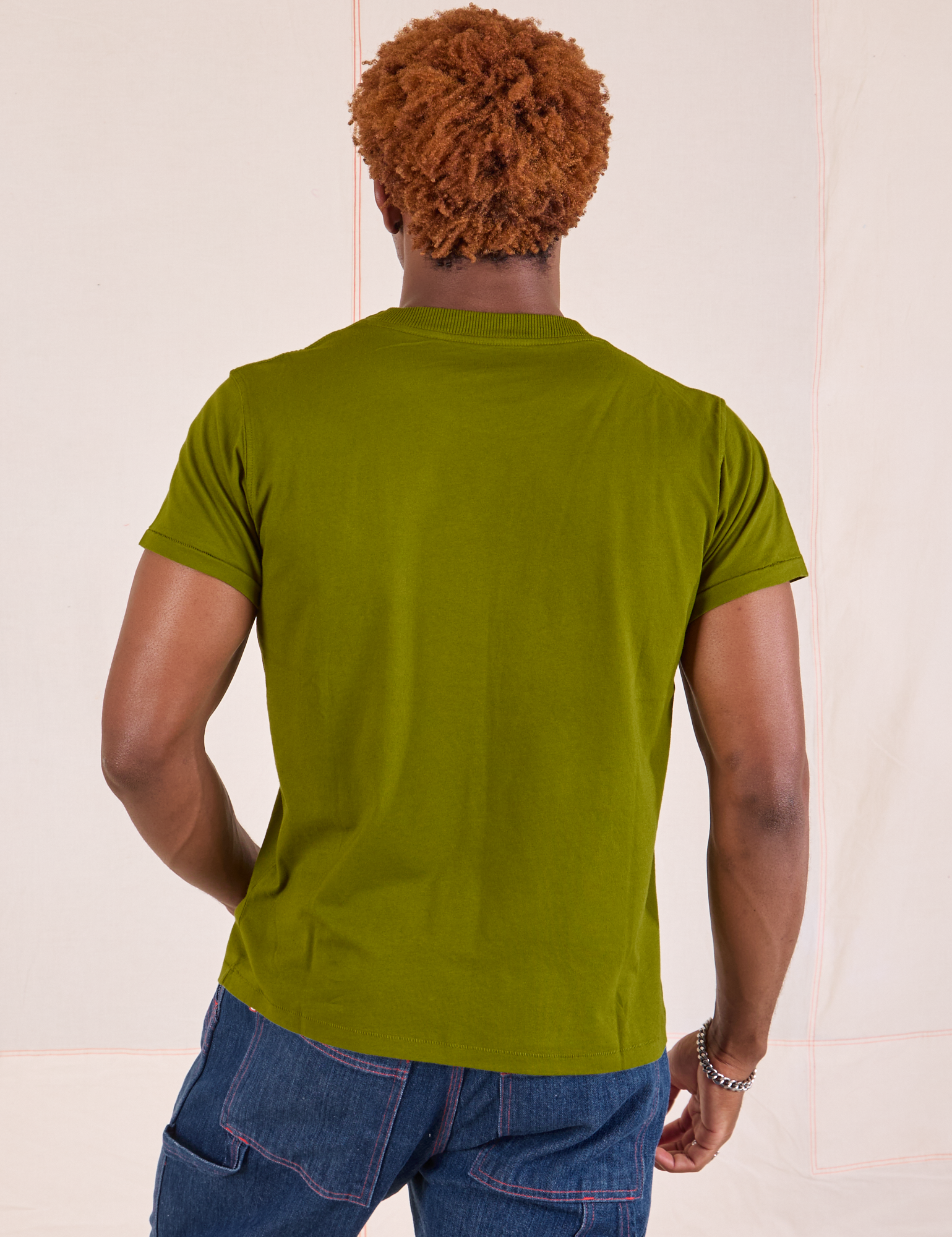 Organic Vintage Tee in Summer Olive back view on Issac