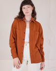 Alex is wearing Twill Overshirt in Burnt Terracotta