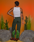 Back view of Paintstamped Work Pants in Cactus and Cropped Tank in Vintage Tee White on Jesse