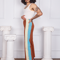 Side view of Hand-Painted Stripe Western Pants in Burnt Terracotta and vintage off-white Tank Top worn by Jesse