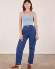 Alex is wearing Cropped Tank Top in Periwinkle and dark wash Denim Trouser Jeans