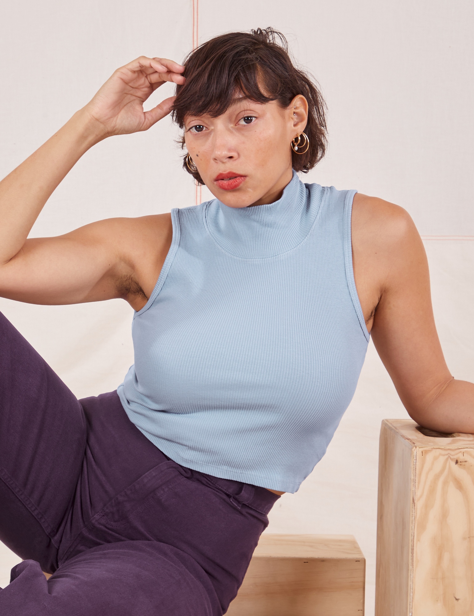 Tiara is 5&#39;4&#39; and wearing XXS Sleeveless Essential Turtleneck in Periwinkle