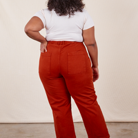 Work Pants in Paprika back view on Morgan wearing a vintage off-white Baby Tee
