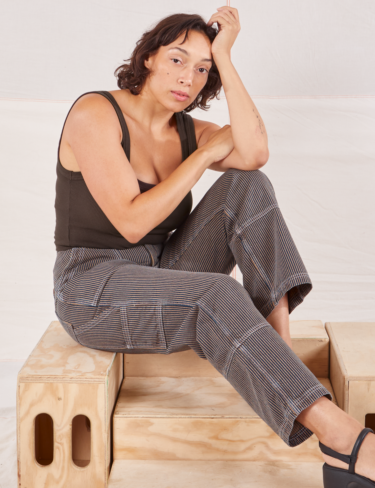 Tiara is wearing Railroad Carpenter Jeans in Vintage Tan and espresso brown Square Neck Tank