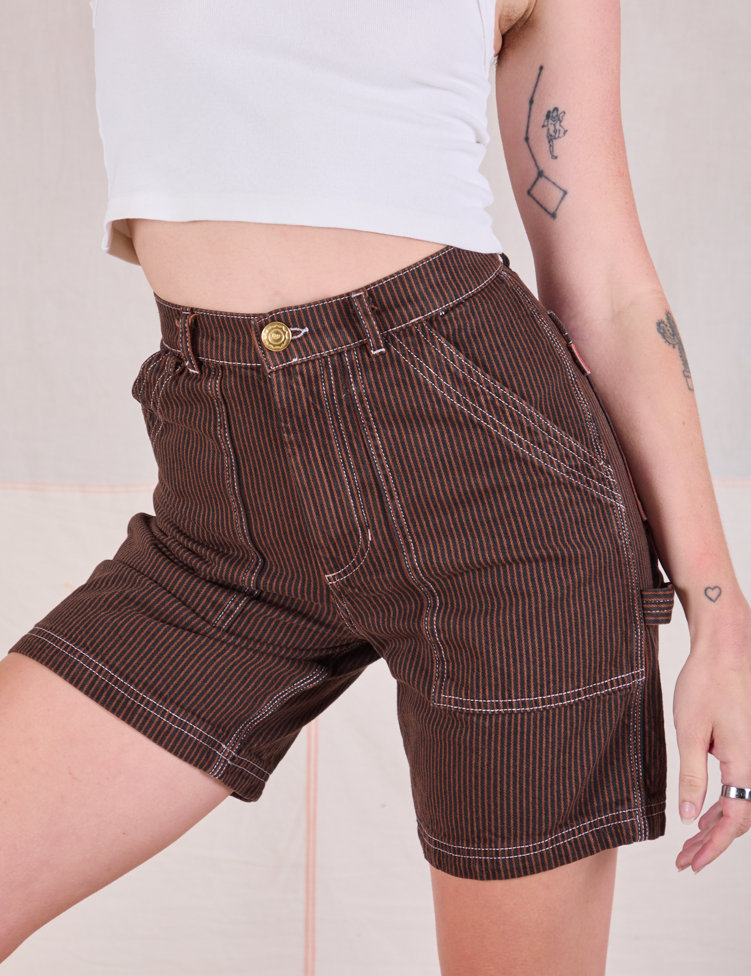 Railroad Carpenter Shorts in Fudgesicle Brown front close up on Alex