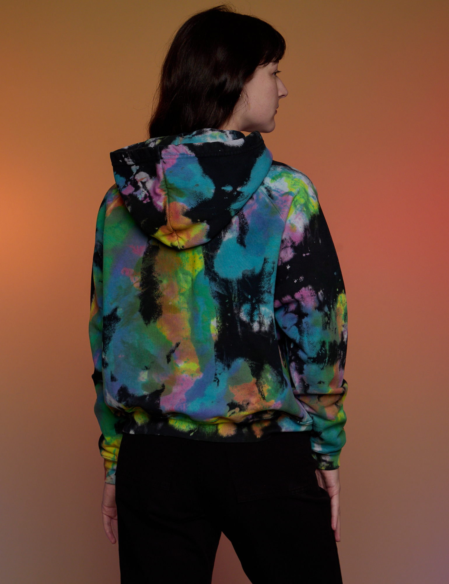 Oversized Hoodie in Rainbow Magic Waters back view on Alex