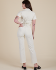 Short Sleeve Jumpsuit in Vintage Tee White back view on Alex