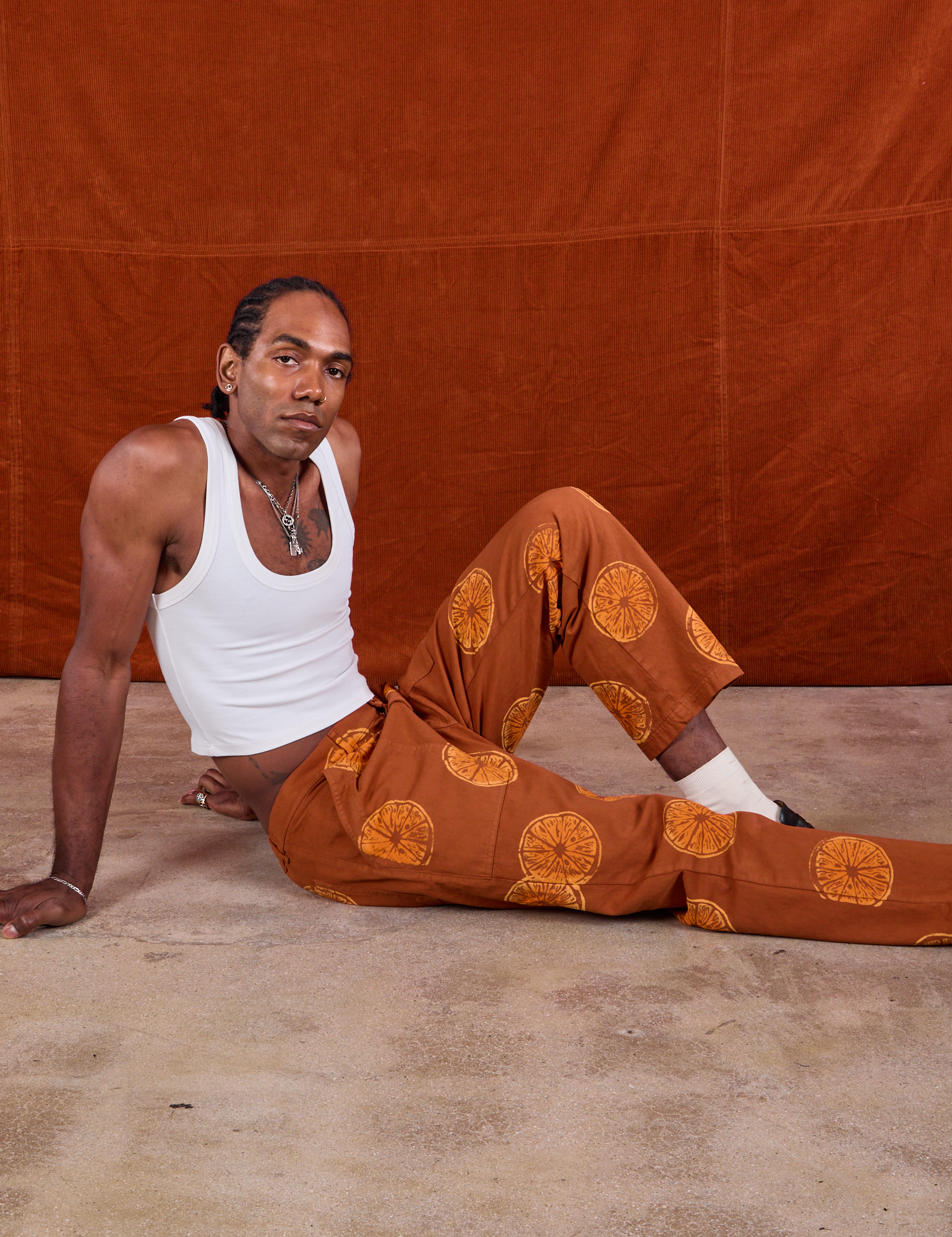 Paintstamped Work Pants in Orange and Cropped Tank in Vintage Tee Off-White on Jerrod