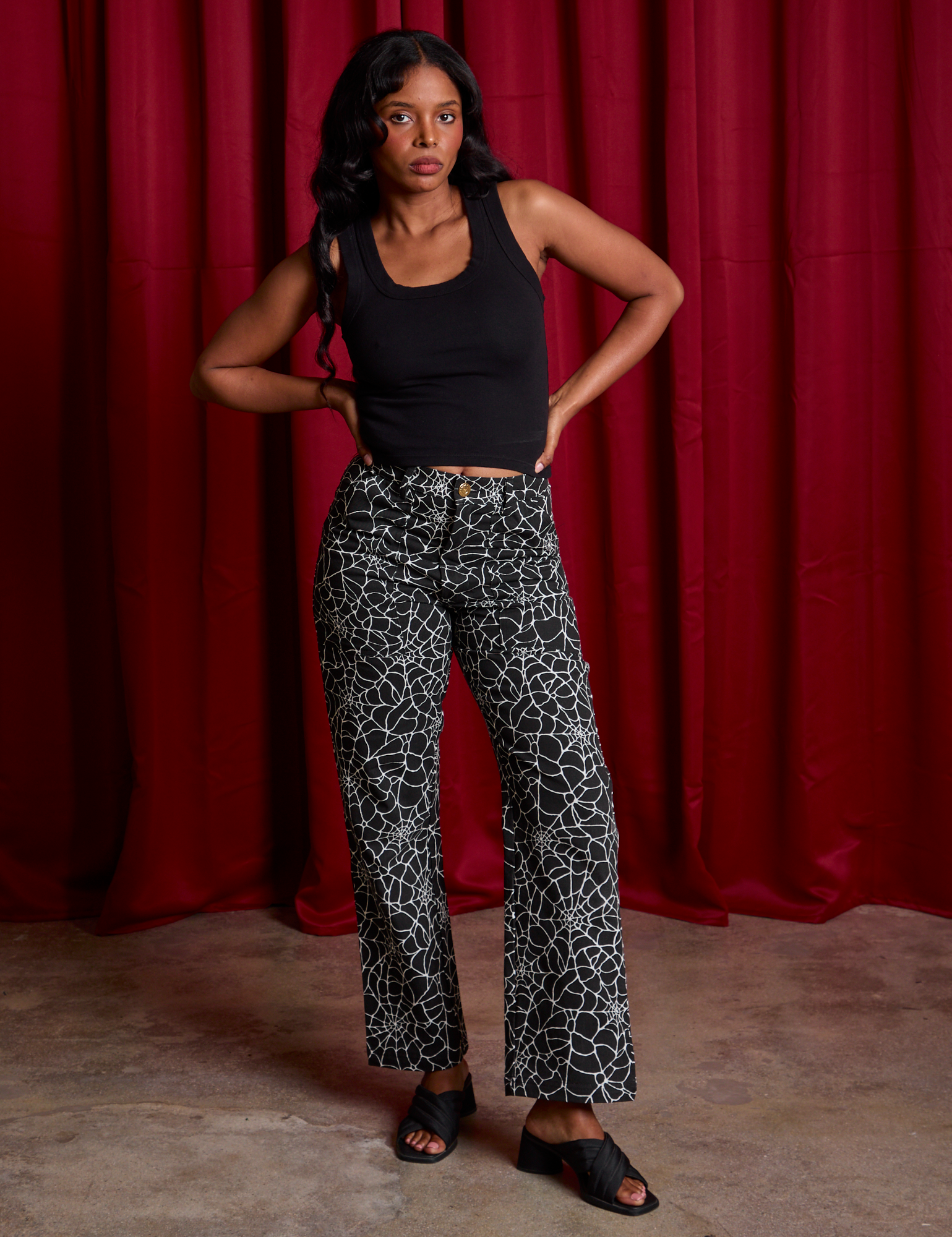 Work Pants in Spiderwebs and black Cropped Tank worn by Kandia