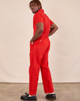 Short Sleeve Jumpsuit in Mustang Red back view on Issac