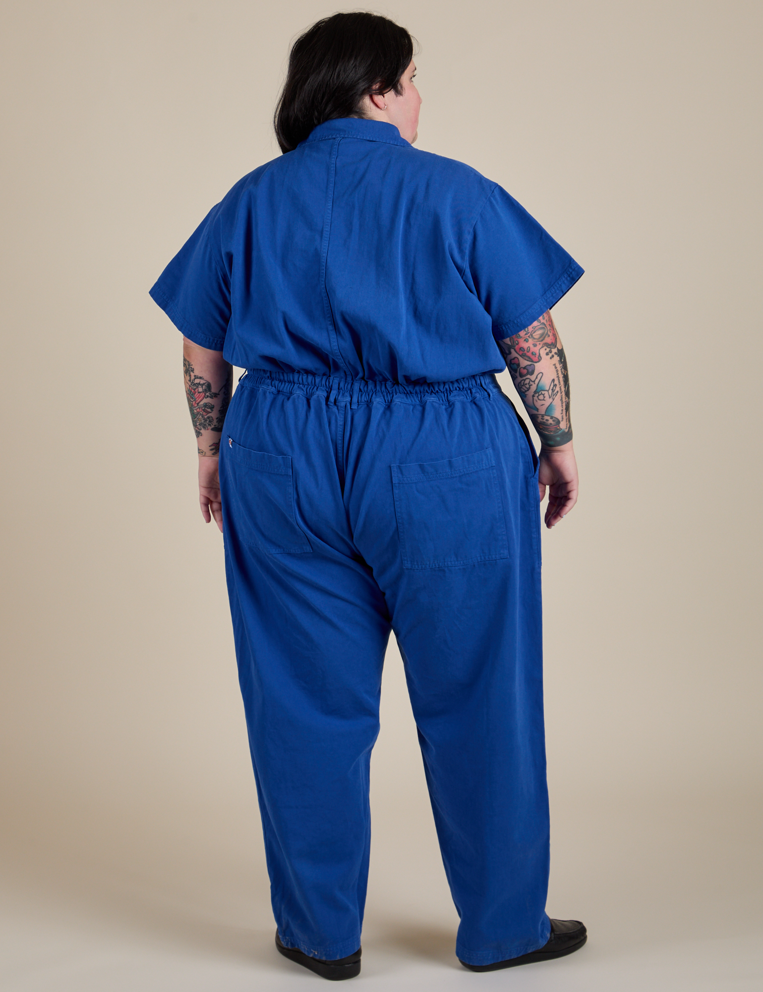 Short Sleeve Jumpsuit in Royal Blue back view on Sam