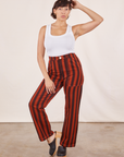 Tiara is 5'4" and wearing S Black Striped Work Pants in Paprika paired with vintage off-white Cropped Tank Top