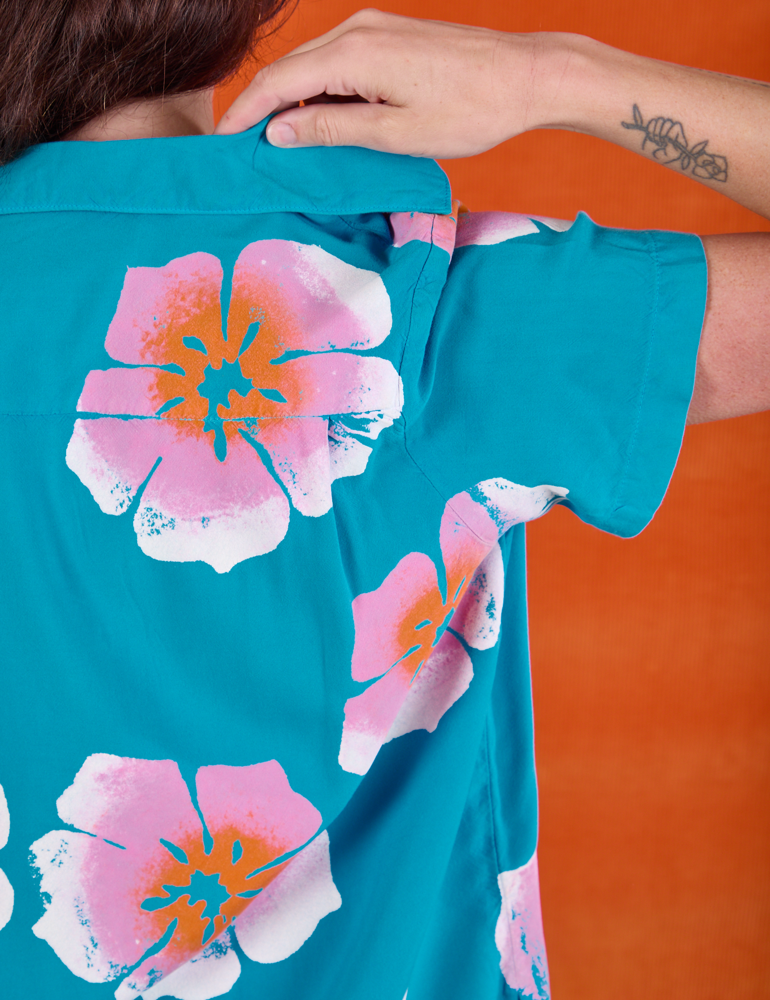 Paintstamped Pantry Button-Up in Hawaiian Blue back shoulder close up on Alex
