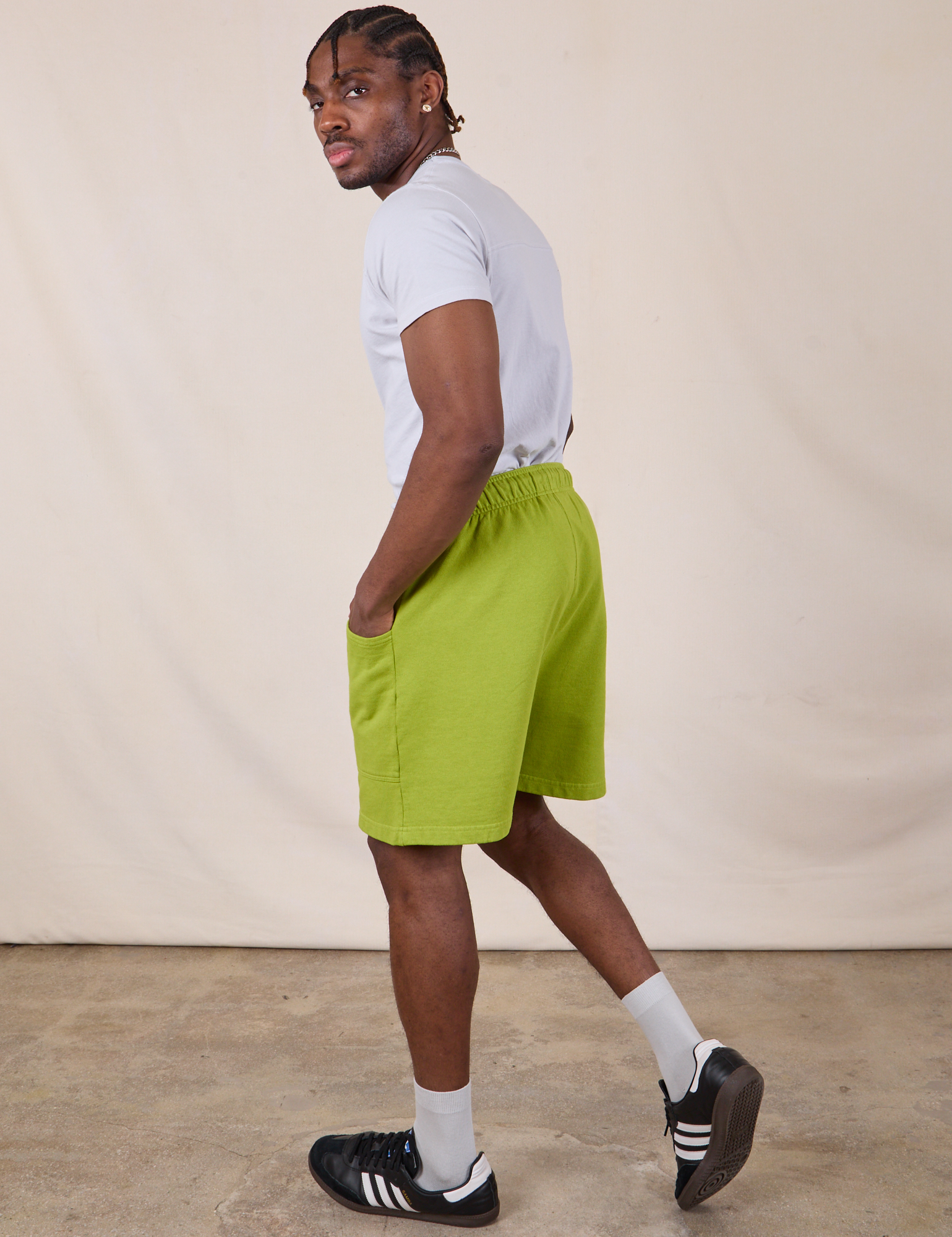 Sweat Shorts in Gross Green side view on Isaac