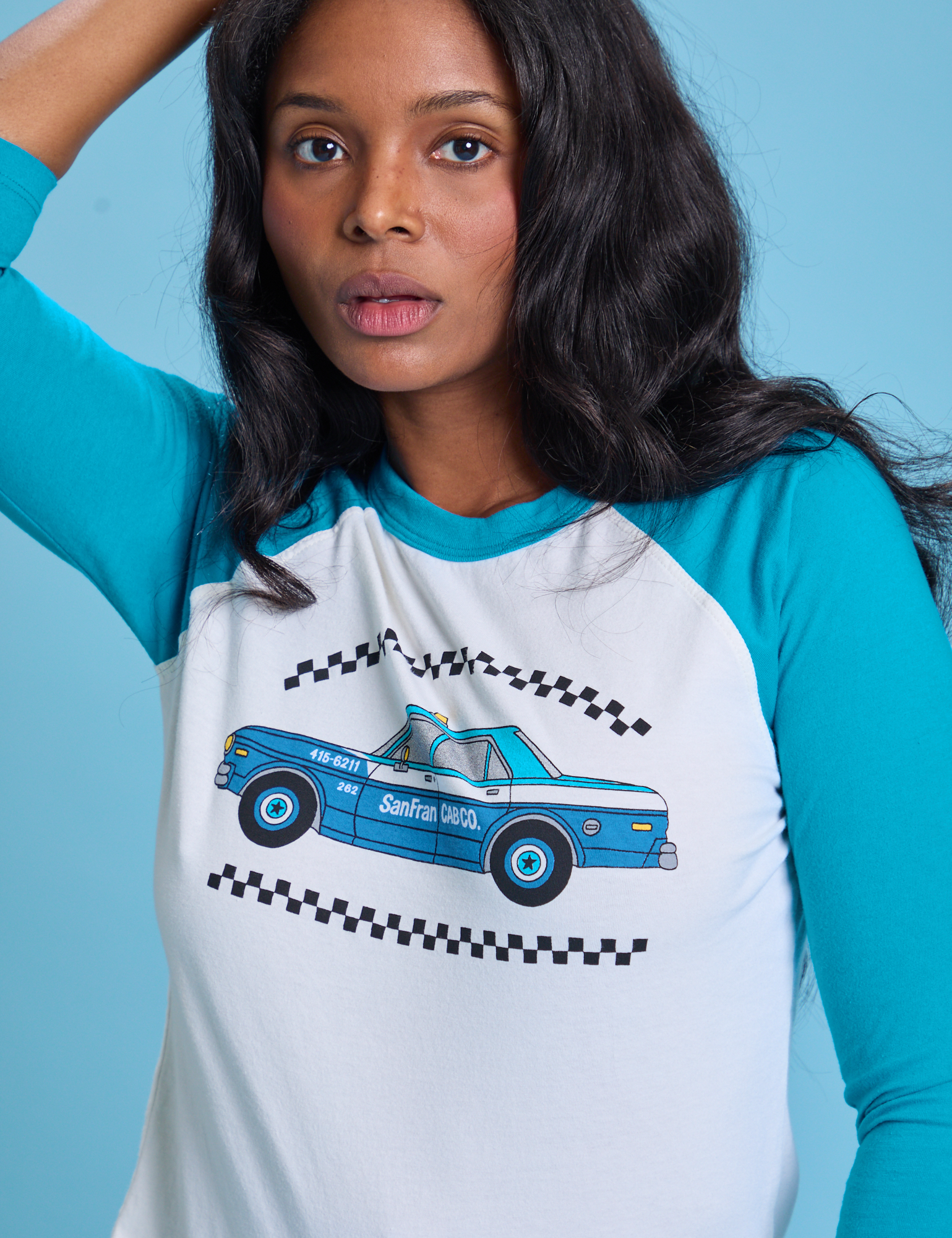 Taxi Raglan Tee in San Francisco front close up on Kandia