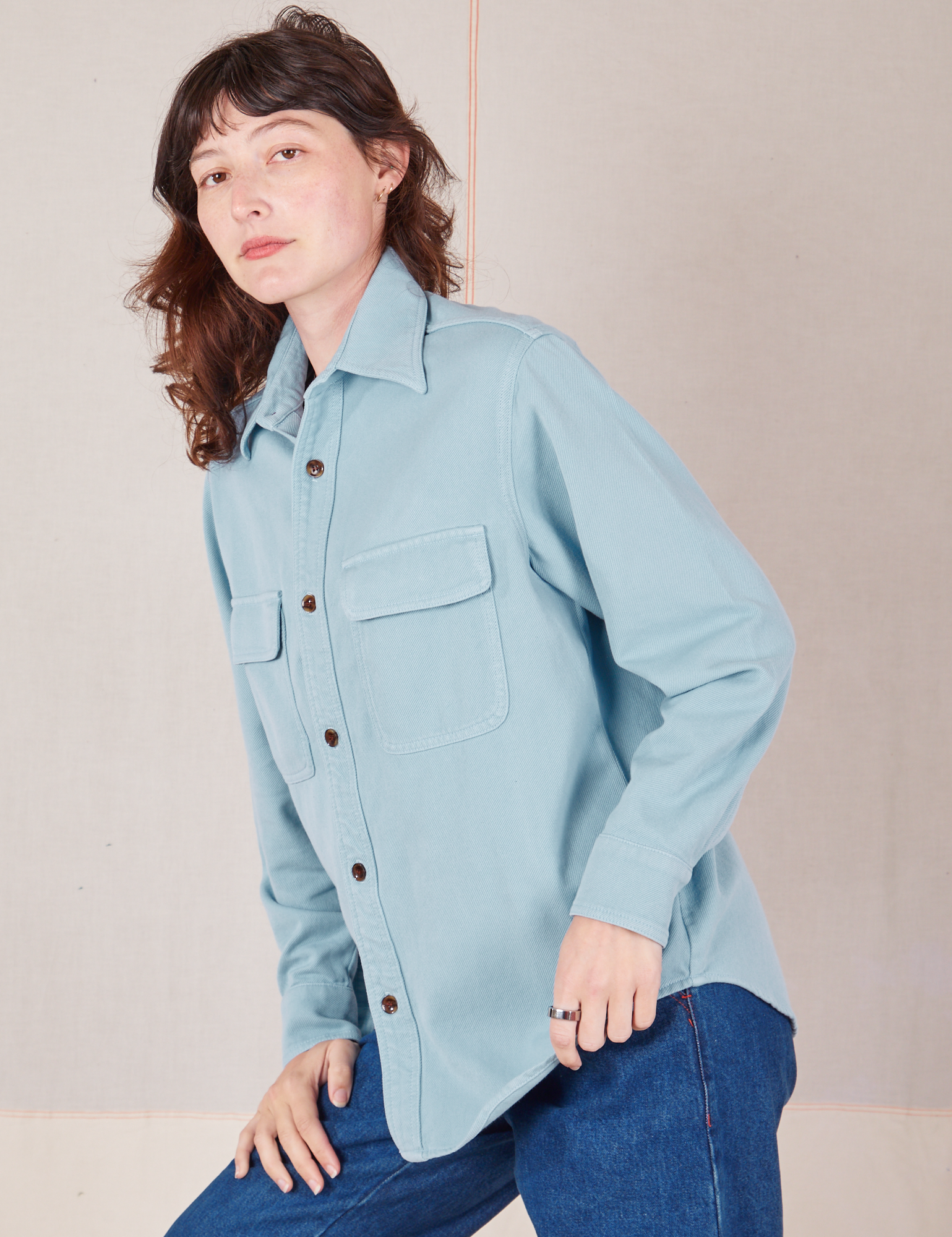 Angled front view of Flannel Overshirt in Baby Blue on Alex