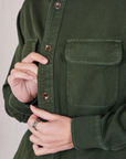 Flannel Overshirt in Swamp Green button placket close up on Alex