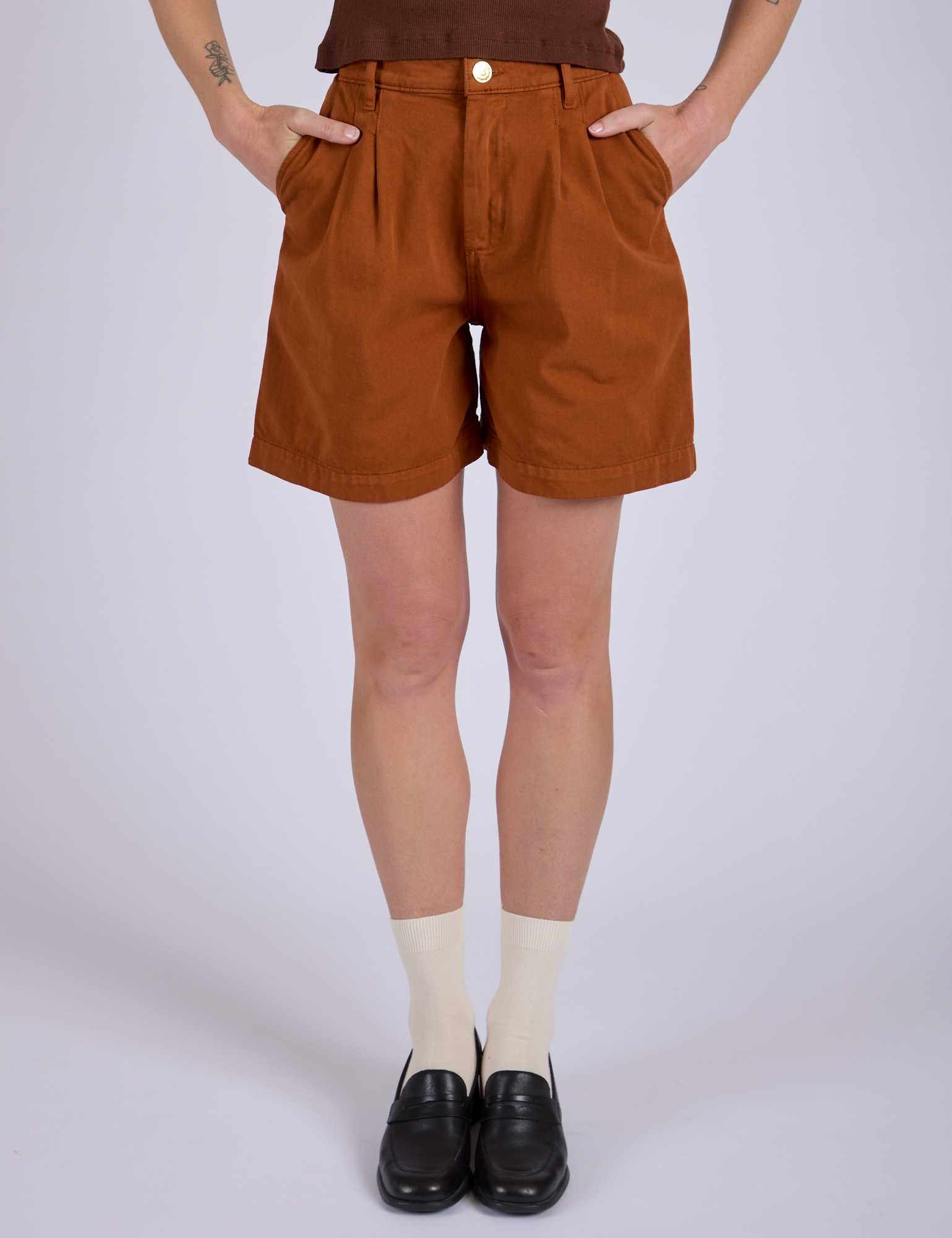 Pleated Trouser Shorts in Burnt Terracotta front close up on Alex
