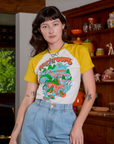 Alex is 5'8" and wearing P Short Sleeve Raglan Tee in Mushrooms
