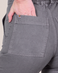 Short Sleeve Jumpsuit in Washed Grey back pocket close up on Alex