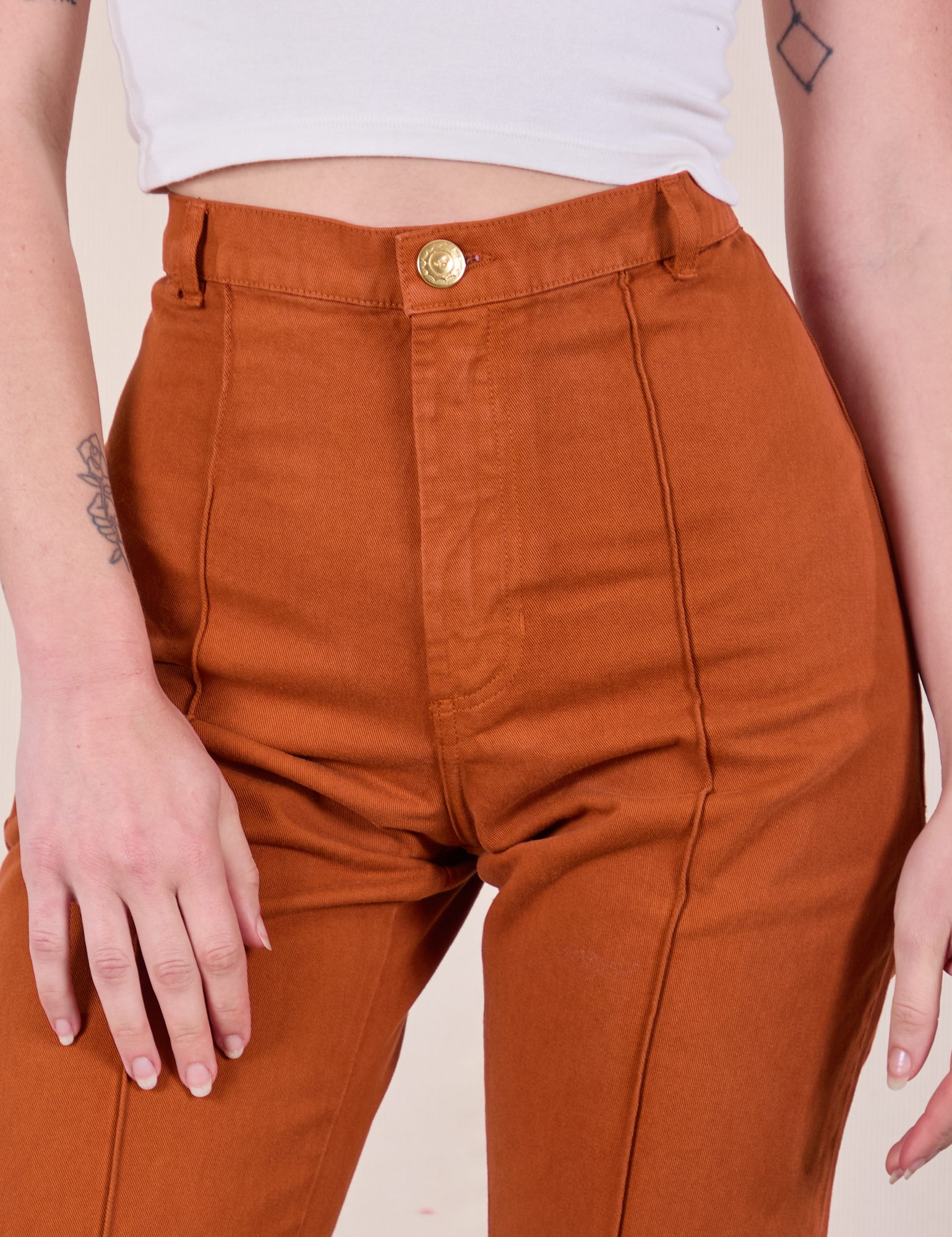 Western Pants in Burnt Terracotta front close up on Alex