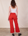 Back view of Western Pants in Mustang Red and Cropped Cami in Vintage Tee Off-White on Alex