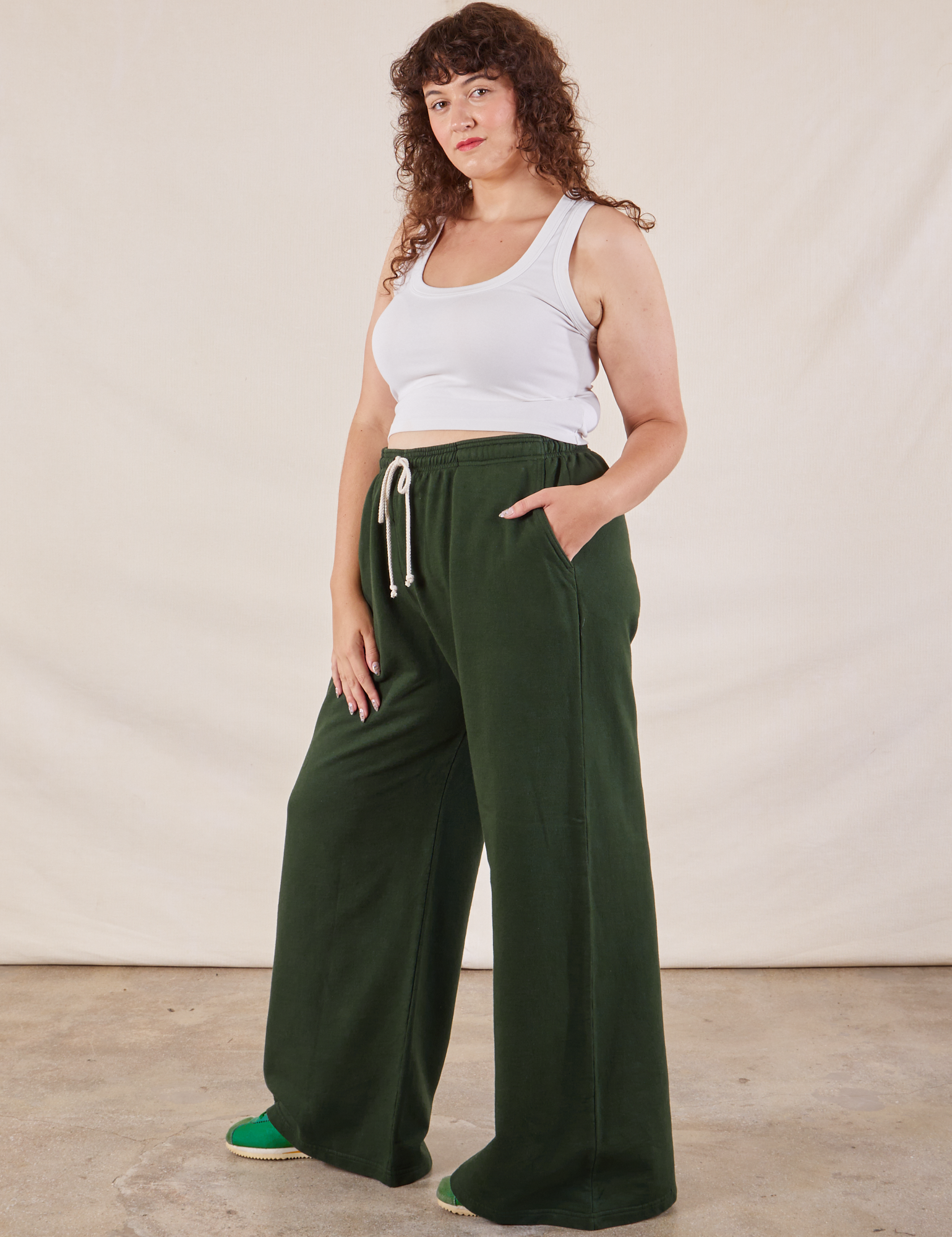 Wide Leg Sweat Pants in Swamp Green side view on Ryan