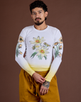 Jesse is 5’7” and wearing S Floral Long Sleeve Baby Tee in Yellow