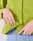 Denim Work Jacket in Gross Green front close up on Alex