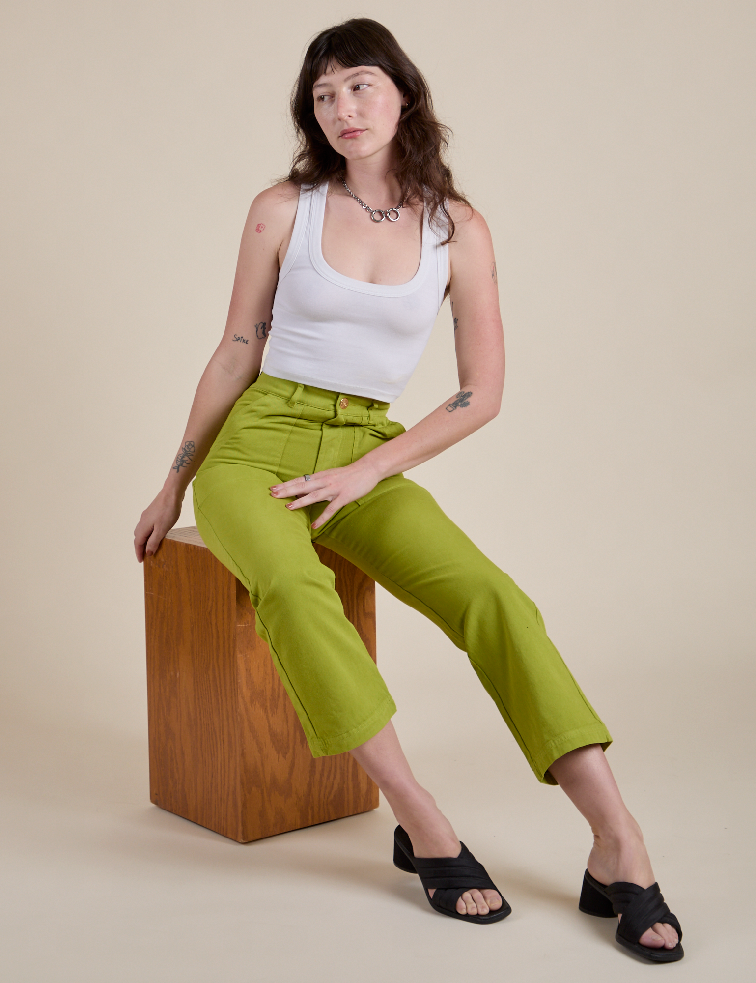 Work Pants in Gross Green and Cropped Tank in Vintage Tee white on Alex
