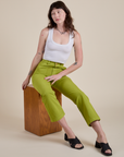 Work Pants in Gross Green and Cropped Tank in Vintage Tee white on Alex
