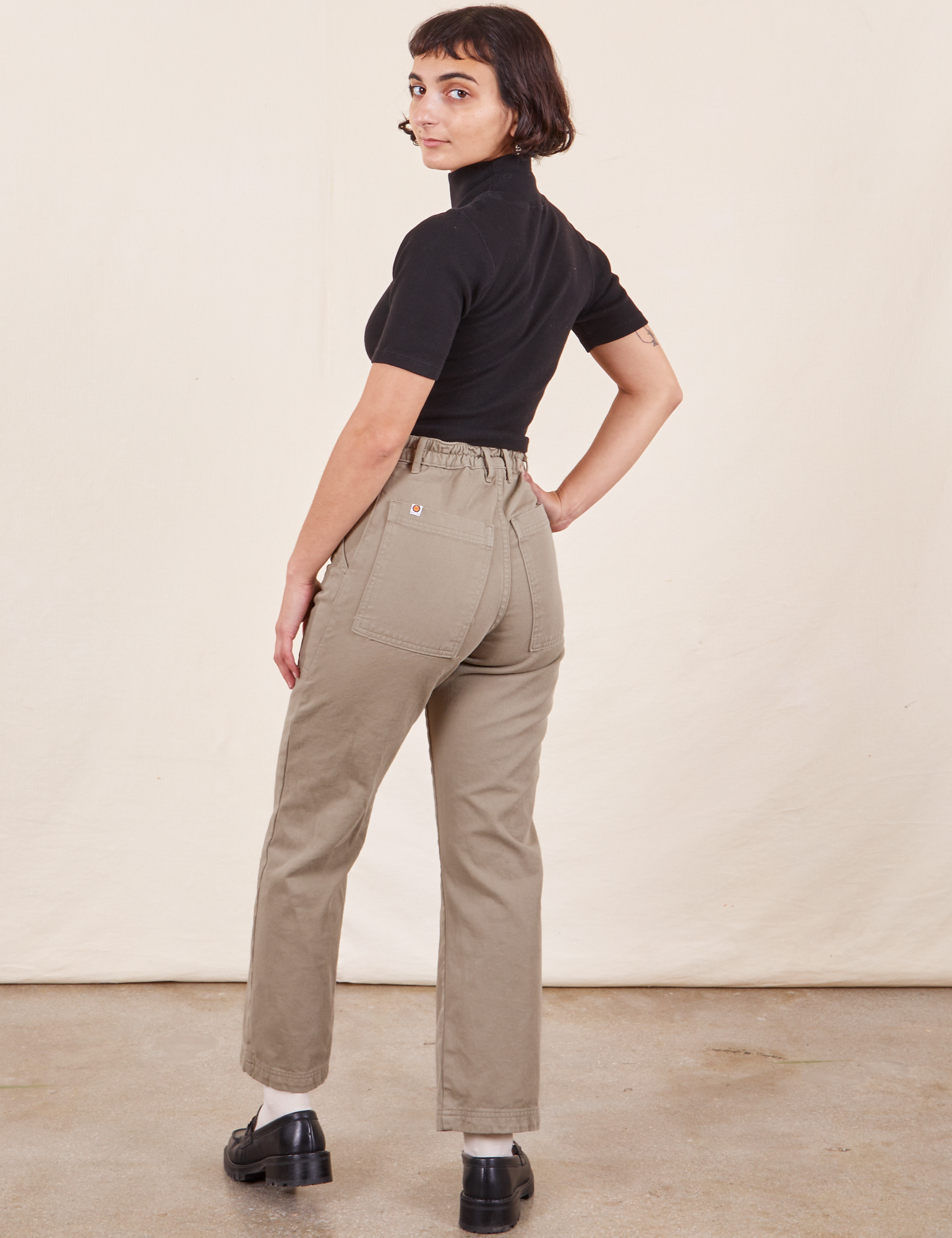 Work Pants in Khaki Grey back view on Soraya wearing black 1/2 Sleeve Turtleneck