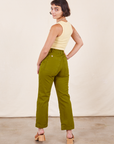 Work Pants in Olive Green back view on Soraya wearing butter yellow Tank Top