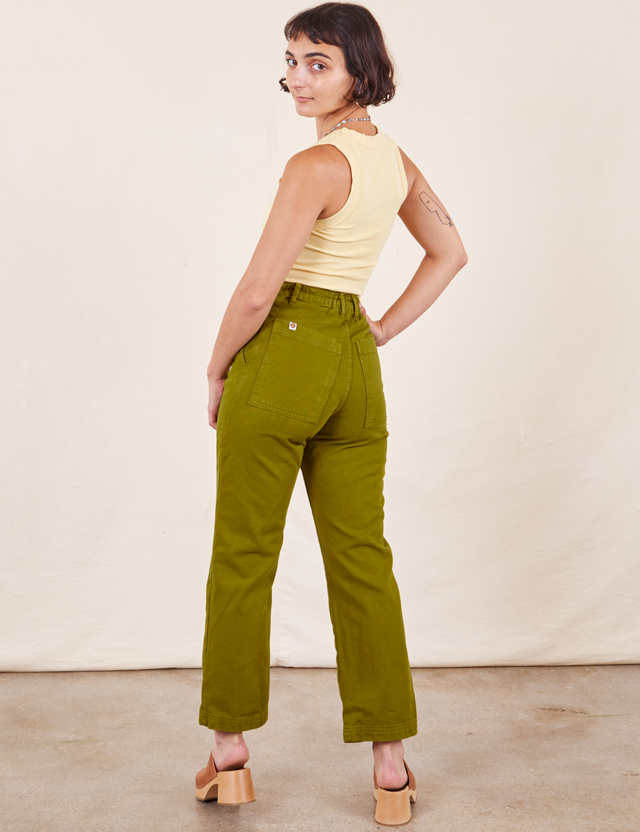 Work Pants in Olive Green back view on Soraya wearing butter yellow Tank Top