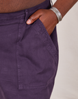 Classic Work Shorts in Nebula Purple front pocket close up. Elijah has his hand in the pocket.
